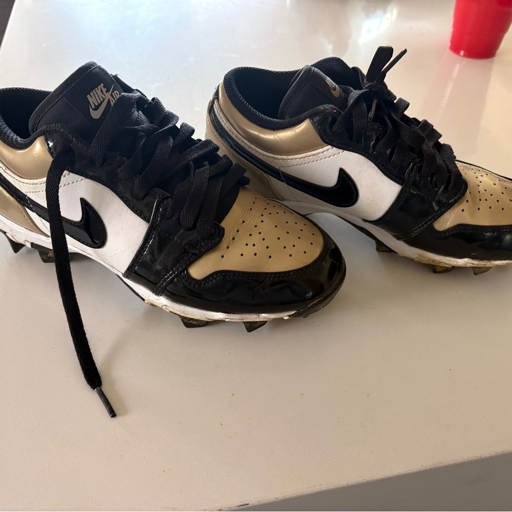 Black and Gold Jordan cleats